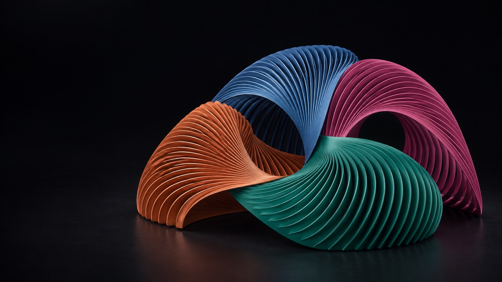 Curved coral, blue, magenta and jade layers meet around dark openings in a single sculptural assembly.